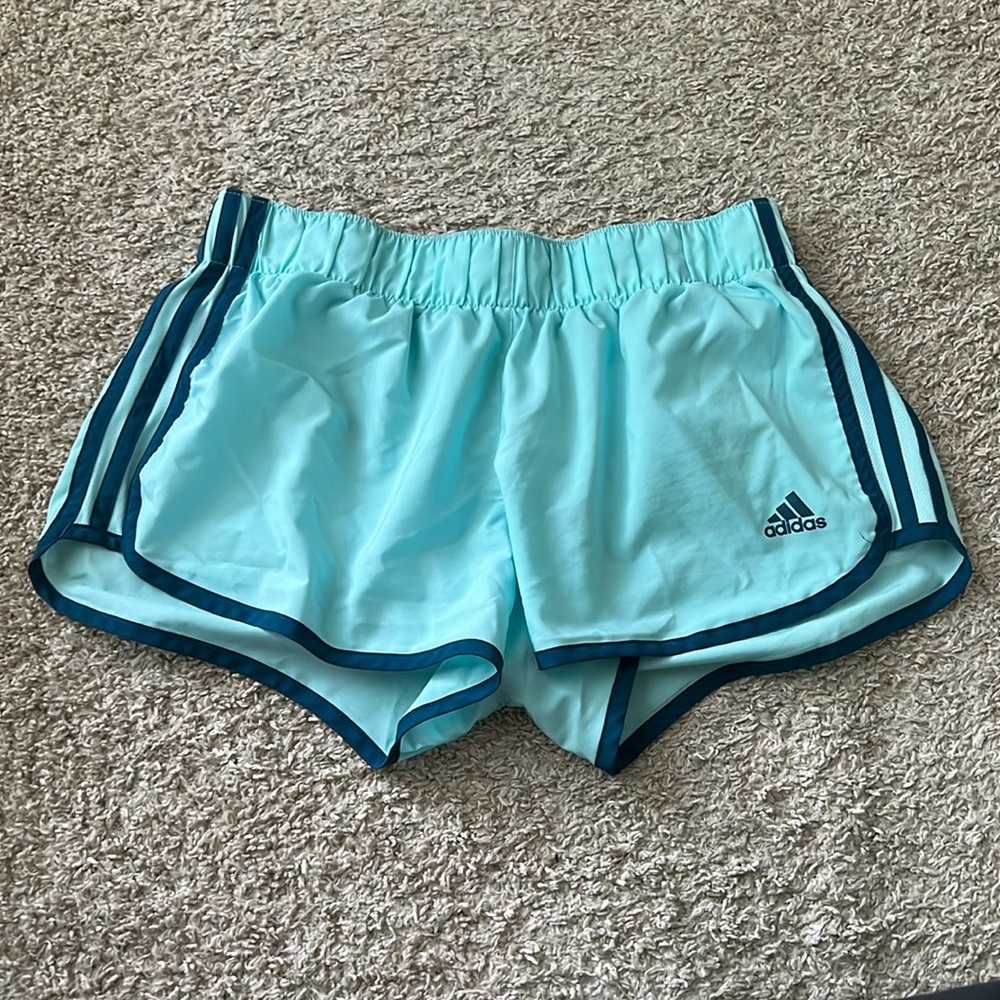 Light blue adidas running shorts